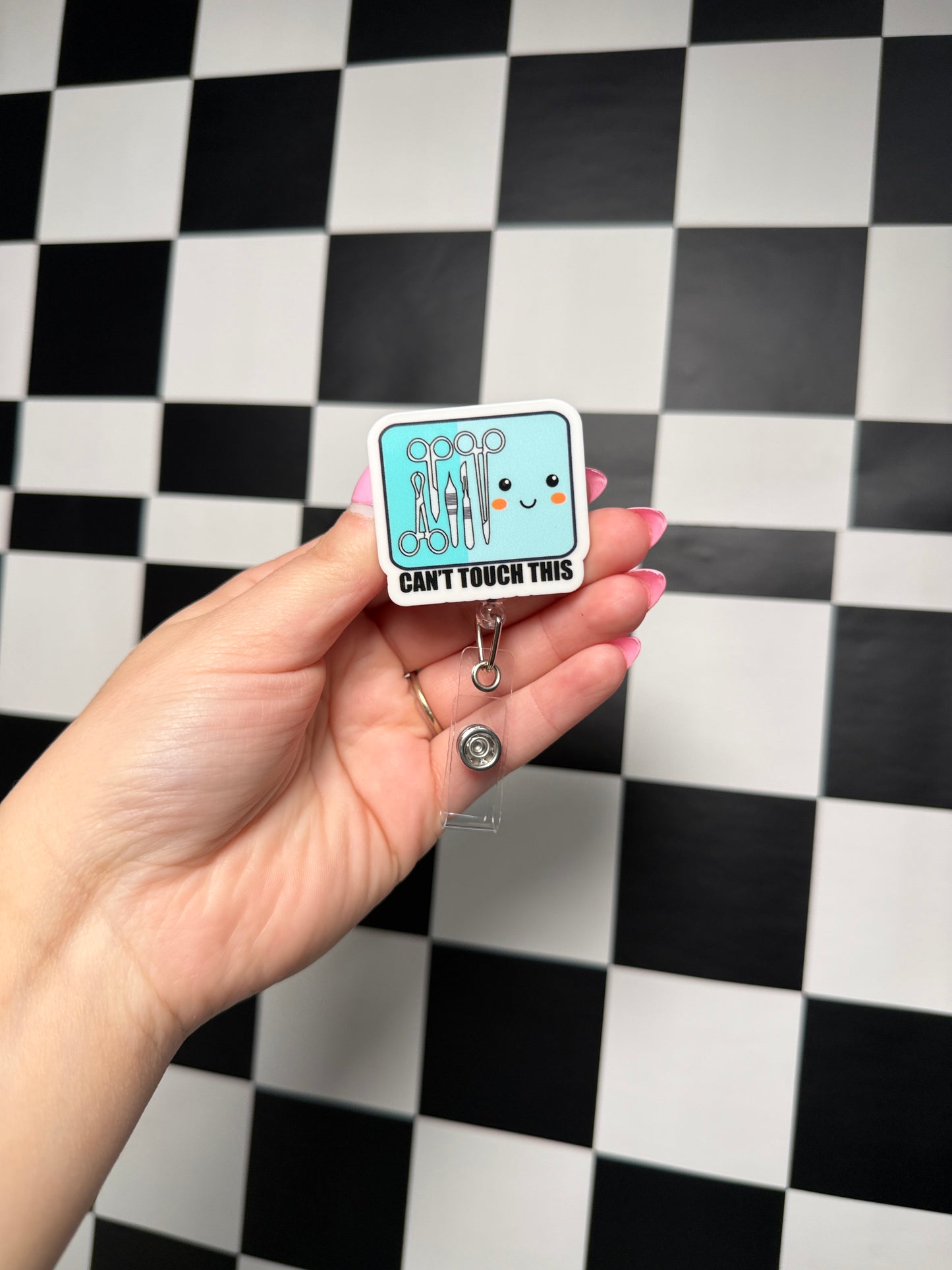 Can’t touch this Badge Reel