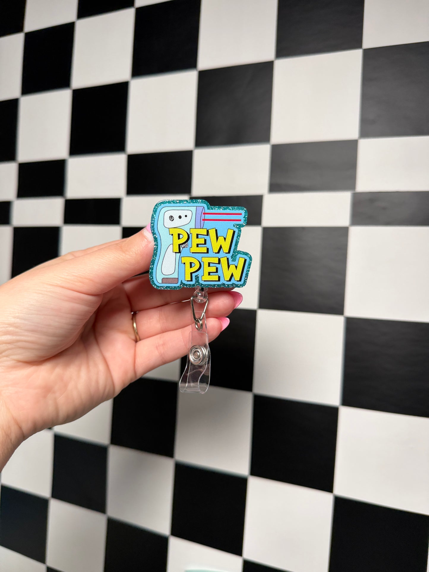 Pew pew Badge Reel